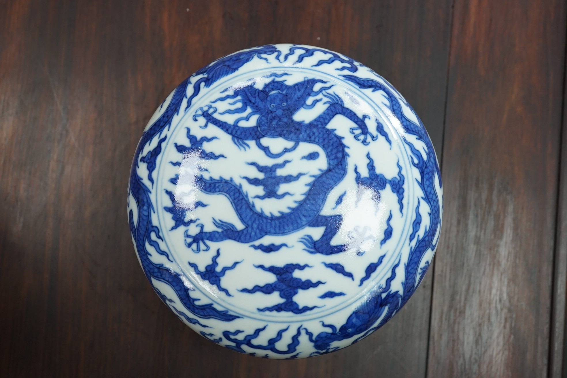 A Chinese blue and white ‘dragon’ box and cover, Jiajing six character mark, 19th century